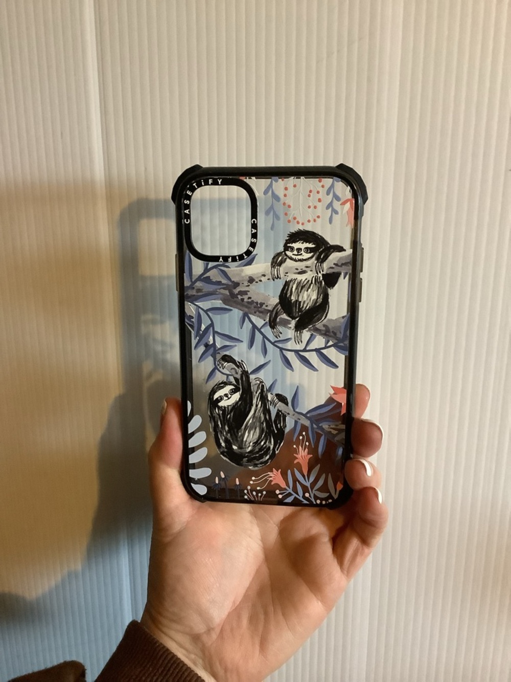 Casetify Clear Sloth Phone Case with Black Trim and Blue Accents